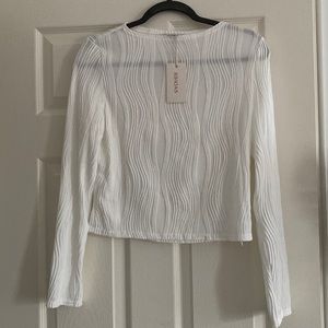 The Solid Color Wave Textured Tee